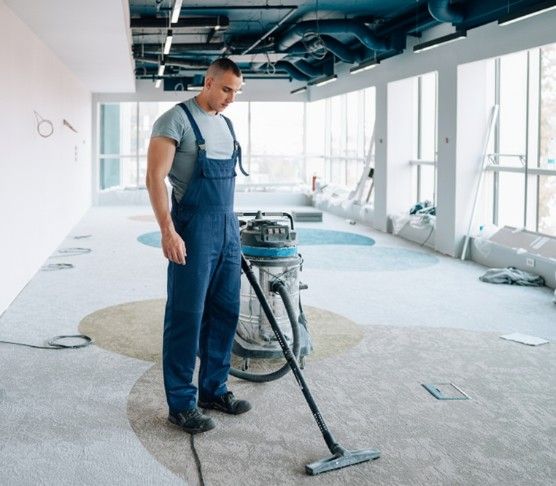 Vcare crew performing post construction cleaning inside a newly renovated commercial space